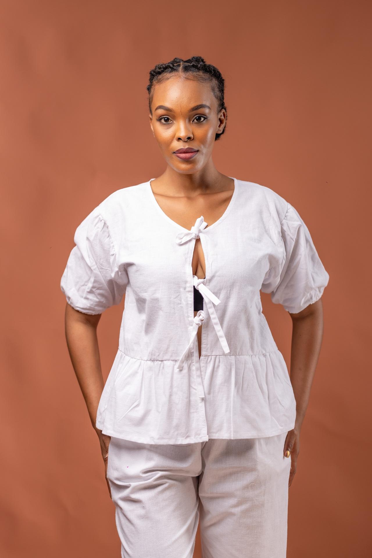 Bow Top with Peplum in Unknown